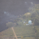 Image for article titled New aerial photos show Kilauea’s lava devouring neighborhoods